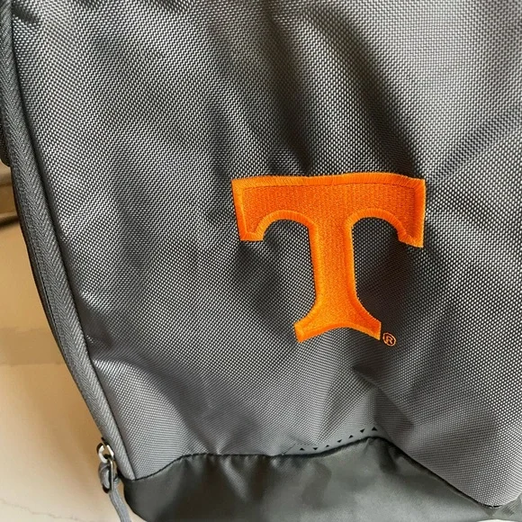 Nike University of Tennessee grey duffel bag. Like new. Handles/shoulder strap Storage
